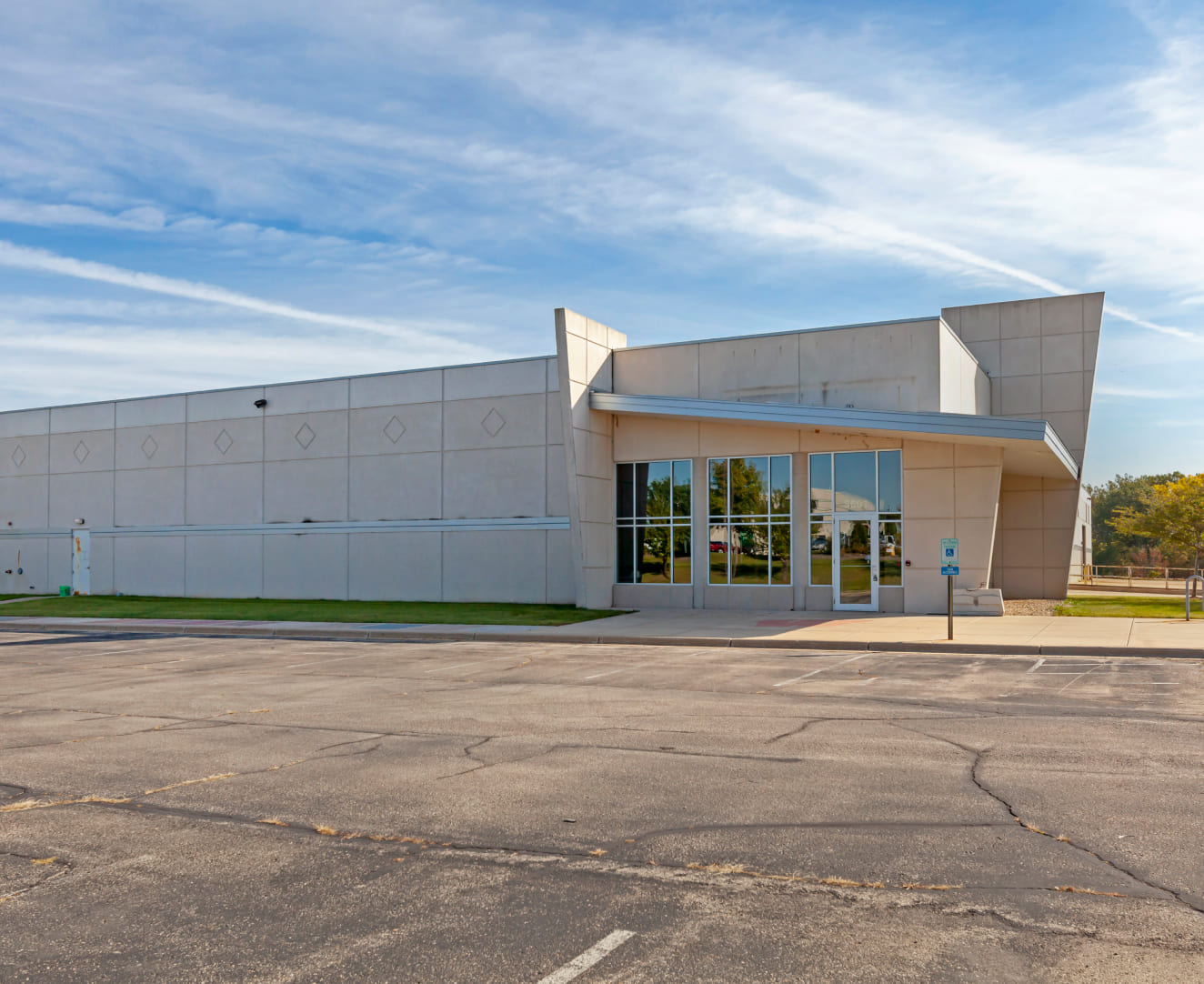 The parking lot and entrance at 5601 Manufacturers Drive in Madison, WI.