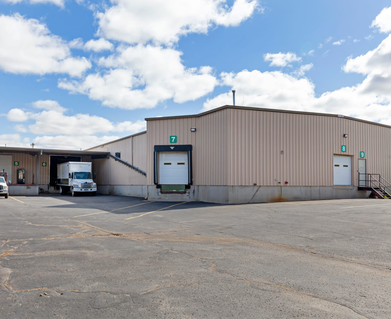 Exterior loading docks 7, 8, and 9 at 2305 Daniels Street and 2250-2258 Mustang Way in Madison, WI.