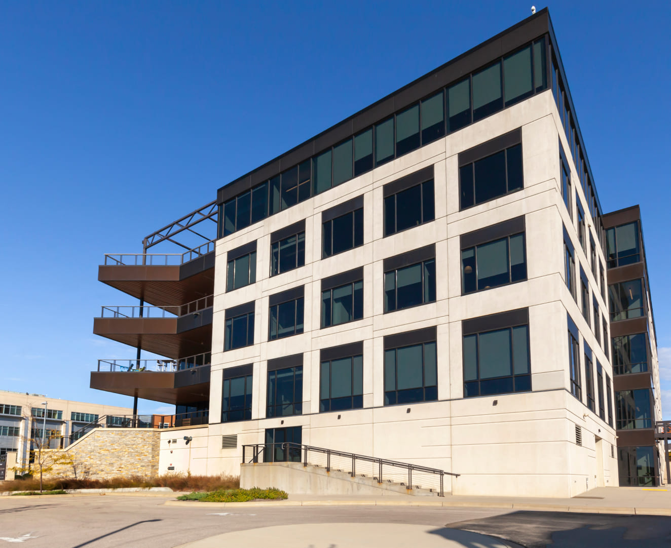 The exterior and balconies of the office building at 2323 Crossroads Drive in Madison, WI.