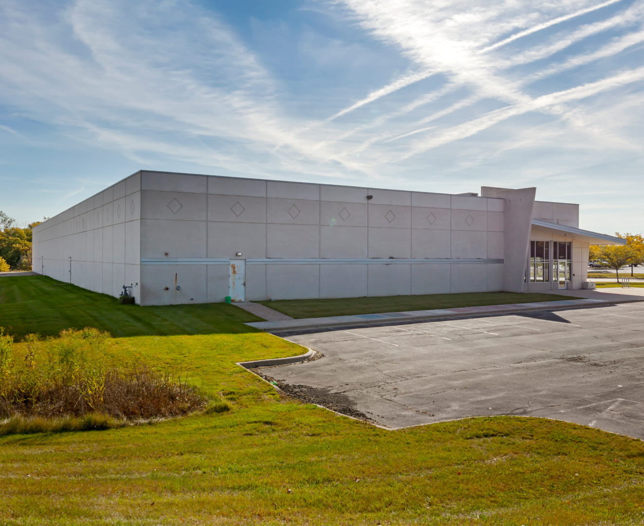 Another view of the parking lot and entrance at 5601 Manufacturers Drive in Madison, WI.