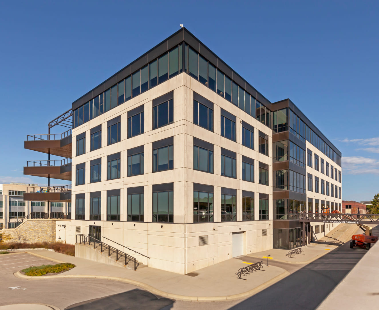 Another view of the exterior and balconies of the office building at 2323 Crossroads Drive in Madison, WI.