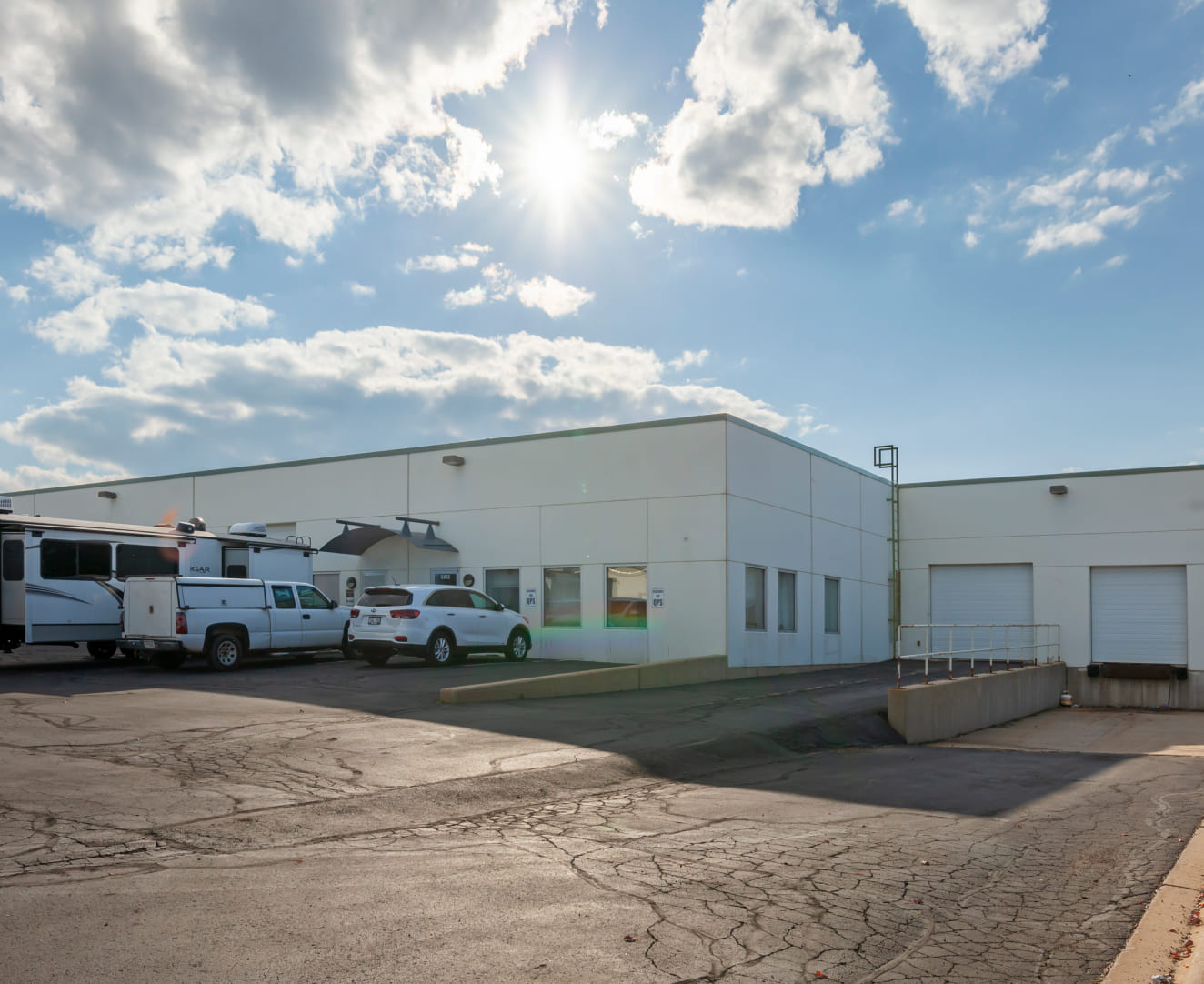 The loading docks and back parking lot at 5802-5820 Manufacturers Drive in Madison, WI.