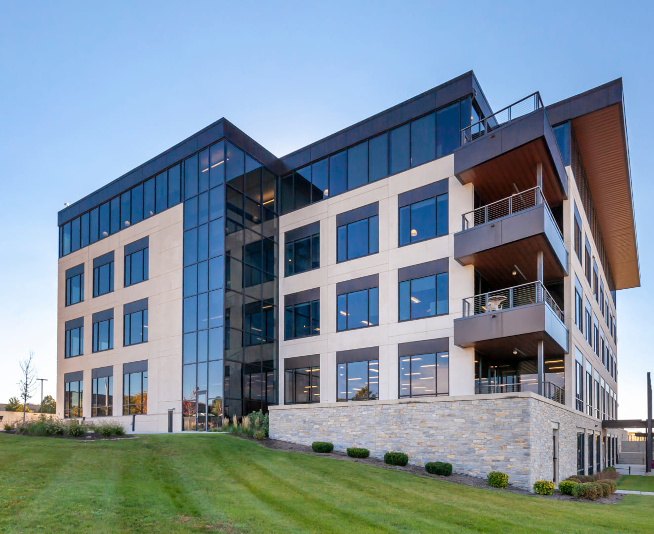A rear view of the exterior and balconies of the office building at 2323 Crossroads Drive in Madison, WI.