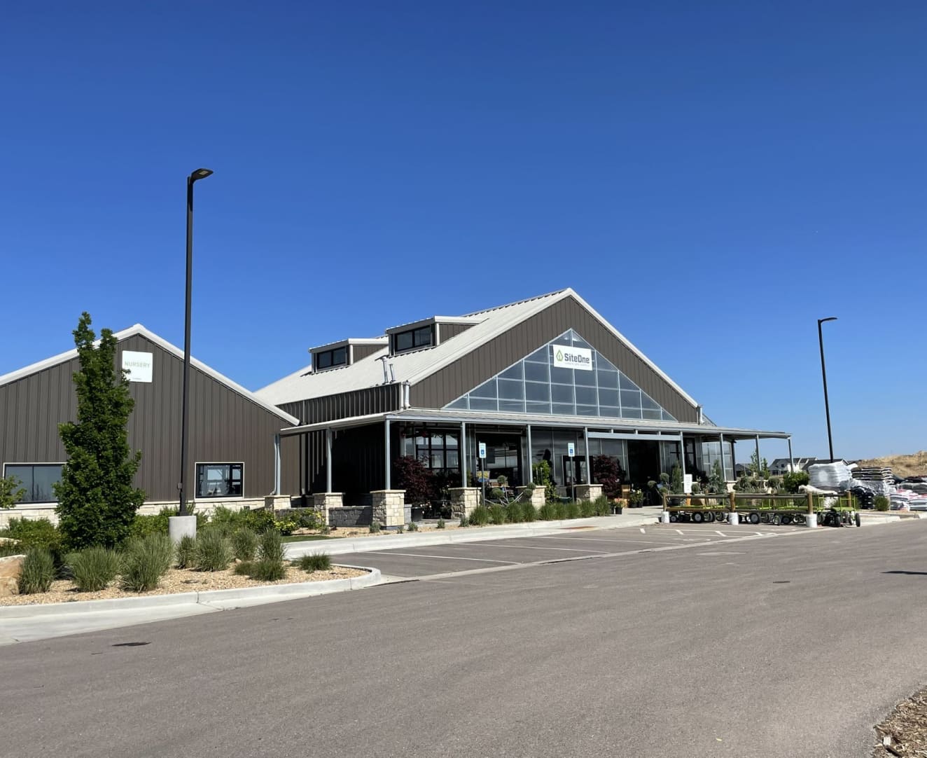 Leftside view of the parking lot and front entrance to 6166 Weld County Road 74 in Windsor, CO.
