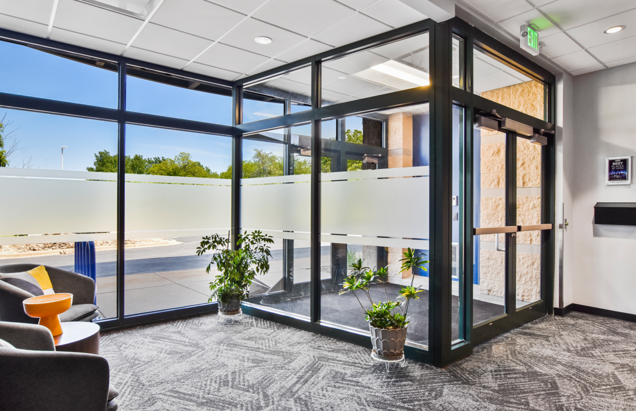 Entrance to an office space showing lobby doors