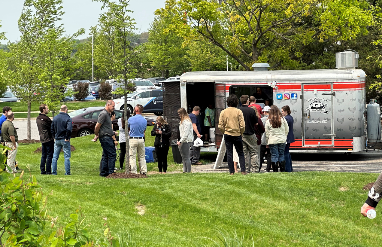 Group of people by a food truck